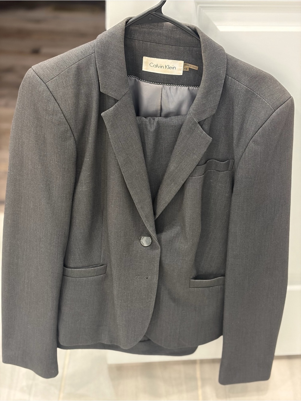 Calvin Klein Women's Gray Single-Button Blazer with matching pants.